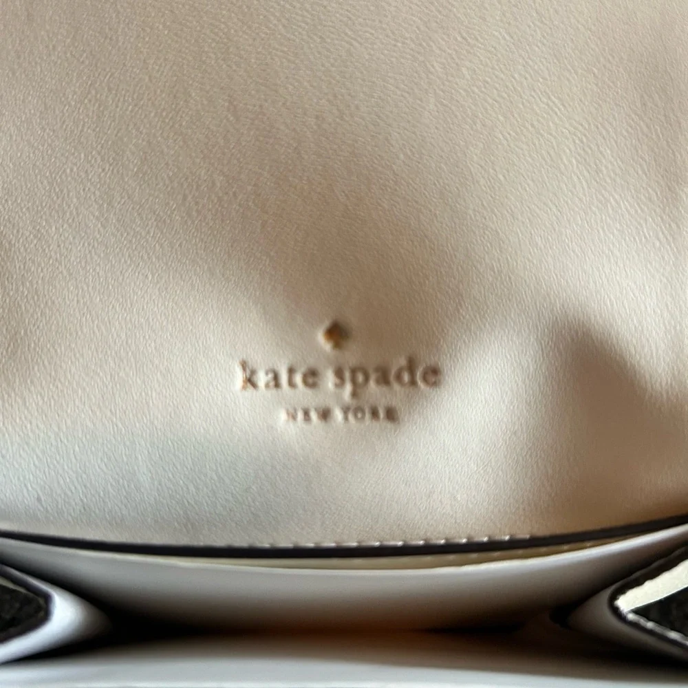 NWT- Kate Spade L- Zip White wallet. In wrapper.